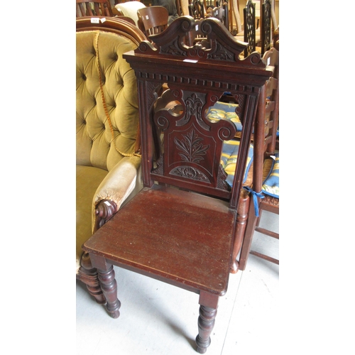 1623 - Pair of Victorian mahogany hall chairs, together with a late Victorian mahogany single hall chair