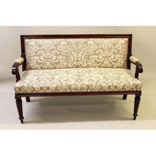 1625 - 19th Century oak simulated as rosewood upholstered sofa with scroll arms, raised on turned hexagonal... 