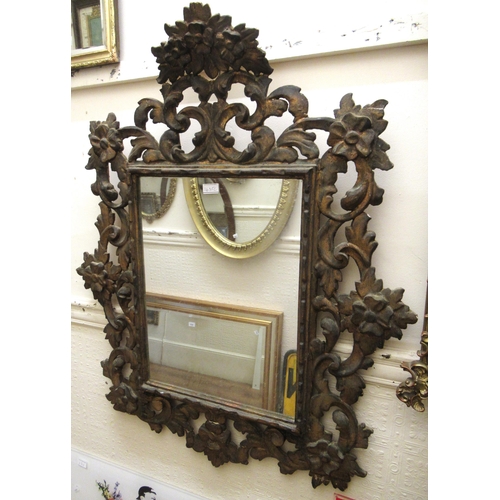 1635C - Late 19th / early 20th Century Continental carved giltwood wall mirror of Florentine design, the pie... 