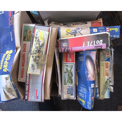 164 - Four boxes containing a large quantity of various unbuilt model aircraft kits