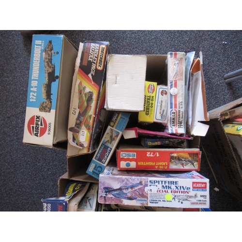 164 - Four boxes containing a large quantity of various unbuilt model aircraft kits