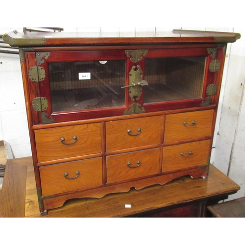 1641 - Low Korean stained wood side cabinet having two glazed doors above an arrangement of six small drawe... 