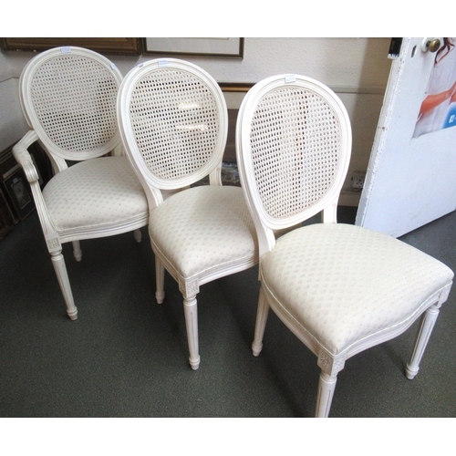 Set of six (two plus four) modern cane back dining chairs with overstuffed seats, in French style on turned tapering, reeded front supports