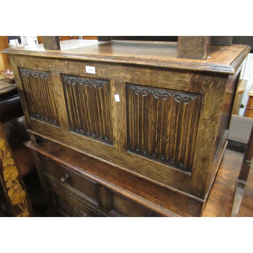 1654 - Reproduction oak coffer, the hinged cover above a three panel front with linen fold decoration, 48cm... 