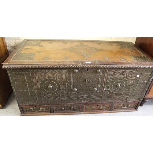 1666 - Early to mid 20th Century Zanzibar teak and brass studded chest, the hinged lid above a nail work fr... 