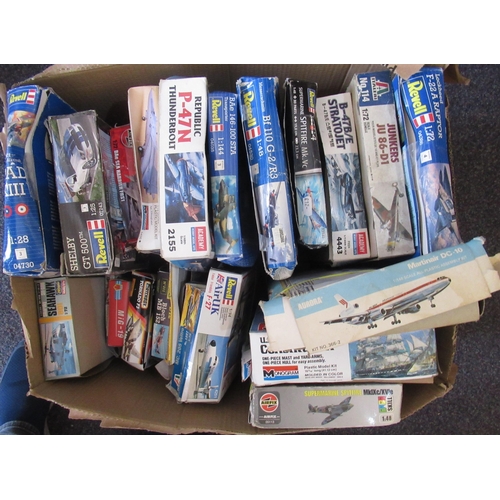 167 - Four boxes containing a large quantity of various unbuilt model aircraft kits including Airfix, Reve... 