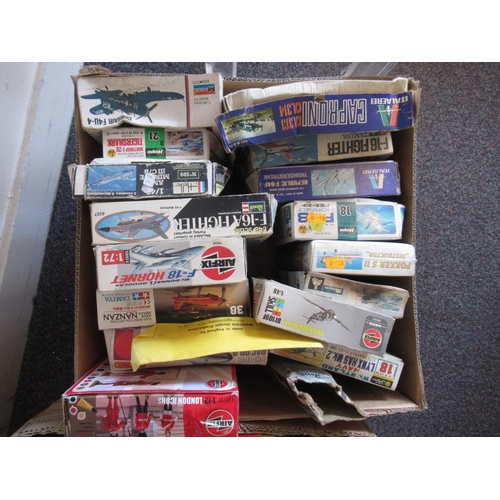 167 - Four boxes containing a large quantity of various unbuilt model aircraft kits including Airfix, Reve... 