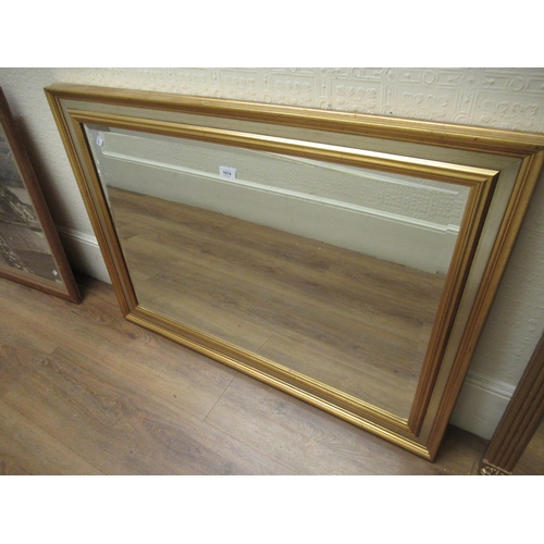 1674 - Modern rectangular gilt framed wall mirror with bevelled plate, 75 x 104cm