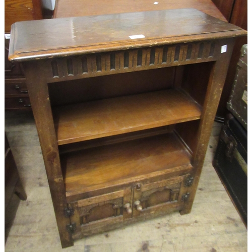 1675 - 20th Century oak open bookcase with two carved panelled doors on stile supports, 87cm high x 66cm wi... 