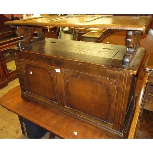 1676 - Mid 20th Century oak monk's bench with two panelled front on bracket feet, 72 x 96 x 40cm