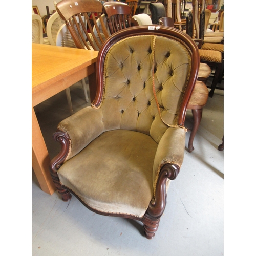 Victorian mahogany button upholstered spoon back elbow chair on turned tapering supports