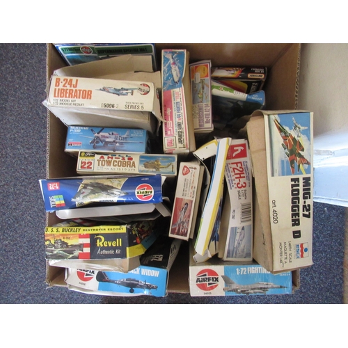 168 - Four boxes containing a large quantity of various model aircraft kits including Airfix, Italeri, Rev... 