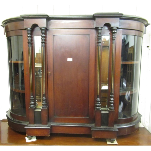 1687 - Victorian mahogany credenza with central panelled door enclosing shelves, flanked by clear glazed cu... 