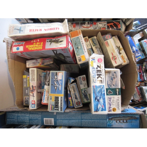 169 - Four boxes containing a large collection of various model aircraft kits including Airfix, Revell, Es... 