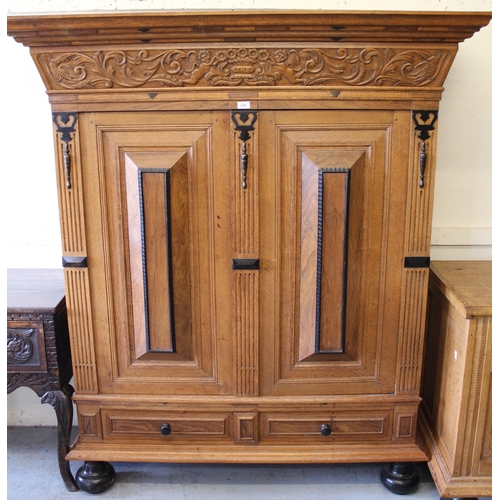 1698 - Dutch panelled oak linen cupboard, the cornice carved with cherubs and birds amongst foliage, over t... 