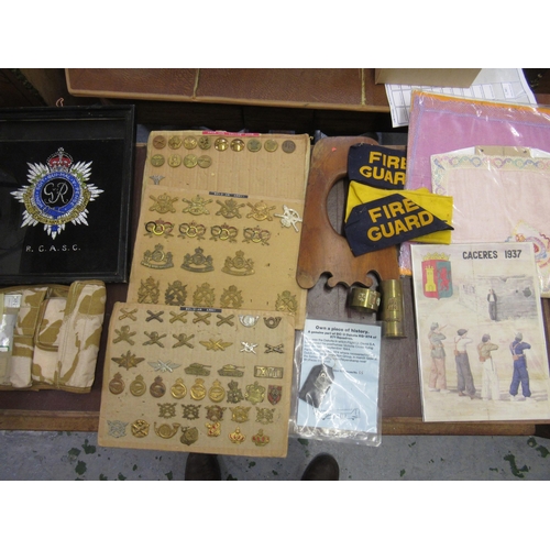 171 - Box containing a large collection of various military related items including three cards of cap bad... 