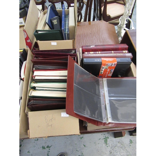 256 - Large quantity of loose stamps, empty albums and postal related books