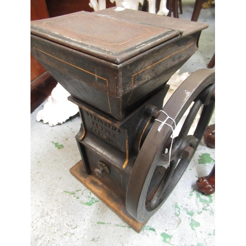 258 - Black painted and gilt decorated cast iron Bartlett's sample tea / mill with drawer, 44cm high