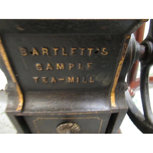 258 - Black painted and gilt decorated cast iron Bartlett's sample tea / mill with drawer, 44cm high