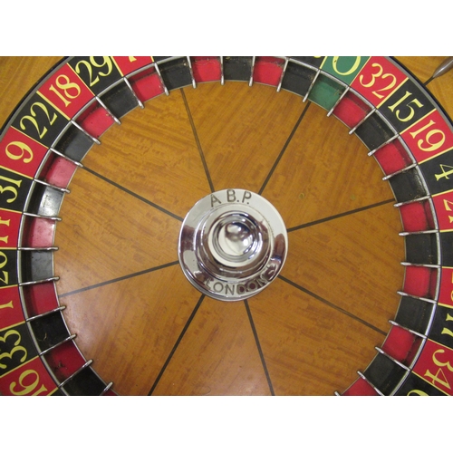 260 - Mid 20th Century full size roulette wheel with satinwood and chrome fitted interior, inscribed A.B.P... 