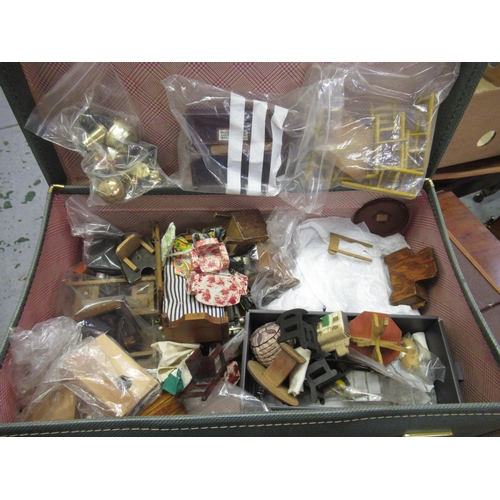 264 - Suitcase containing a quantity of dolls house furniture and fittings