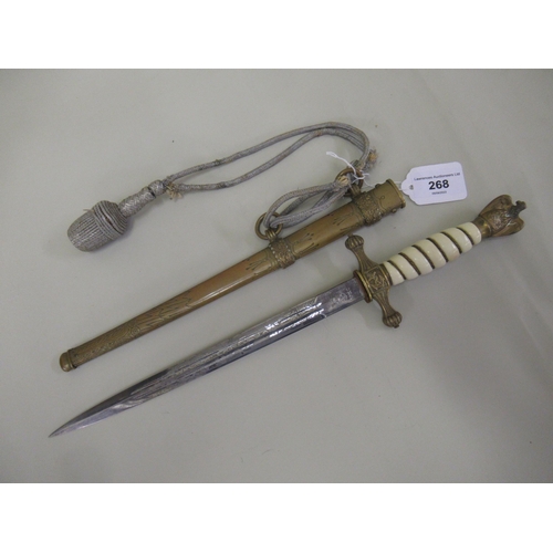 268 - Third Reich Naval officer's dagger with an eagle pommel above a wire bound simulated ivory grip, the... 