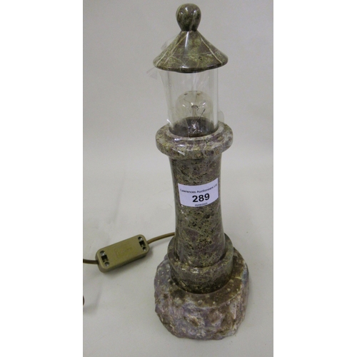 289 - Lizard serpentine stone table lamp in the form of a lighthouse (with associated leaflet), 30cm high