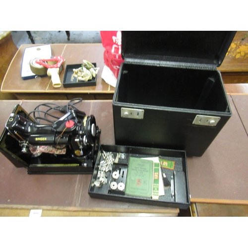 336 - Singer Featherweight portable electric sewing machine, No. 221K, in original case with accessories, ... 