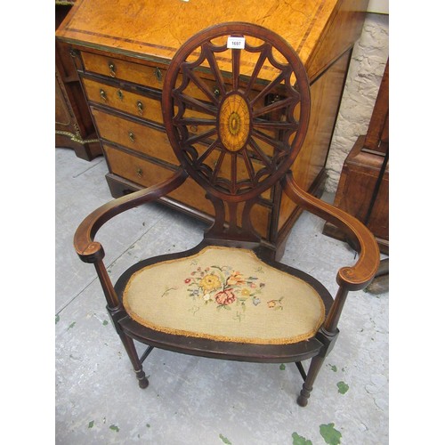 1697 - Sheraton Revival wheelback armchair with satinwood and fan inlay and shaped arms and seat, raised on... 