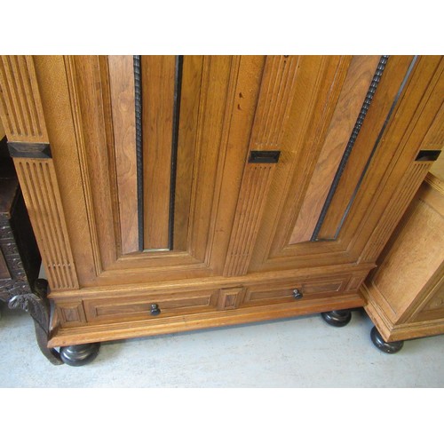 1698 - Dutch panelled oak linen cupboard, the cornice carved with cherubs and birds amongst foliage, over t... 