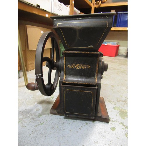 258 - Black painted and gilt decorated cast iron Bartlett's sample tea / mill with drawer, 44cm high