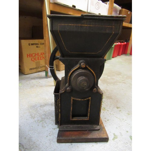 258 - Black painted and gilt decorated cast iron Bartlett's sample tea / mill with drawer, 44cm high