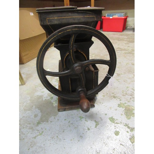 258 - Black painted and gilt decorated cast iron Bartlett's sample tea / mill with drawer, 44cm high