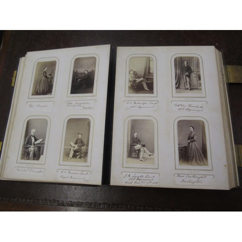 284 - 19th Century photograph album containing a collection of various photographs, the inner cover having... 