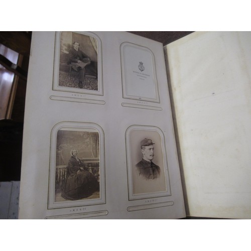 284 - 19th Century photograph album containing a collection of various photographs, the inner cover having... 