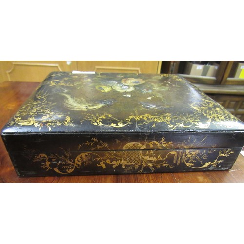 286 - 19th Century black lacquered mother of pearl inset and floral painted games box containing a quantit... 