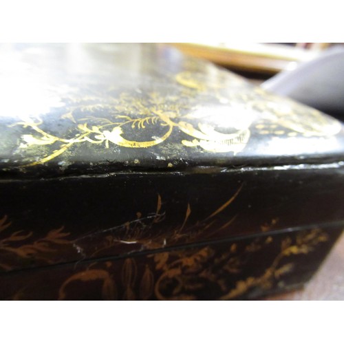 286 - 19th Century black lacquered mother of pearl inset and floral painted games box containing a quantit... 