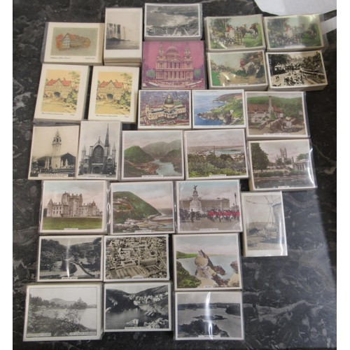 320 - Wooden tray containing a quantity of non standard size cigarette cards in sets