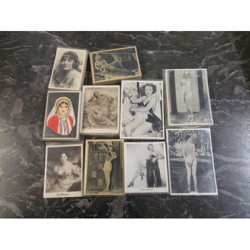 320 - Wooden tray containing a quantity of non standard size cigarette cards in sets