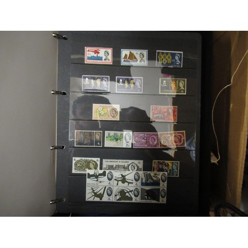 253 - Eleven albums containing a collection of mainly Elizabeth II Great Britain stamps, together with a q... 