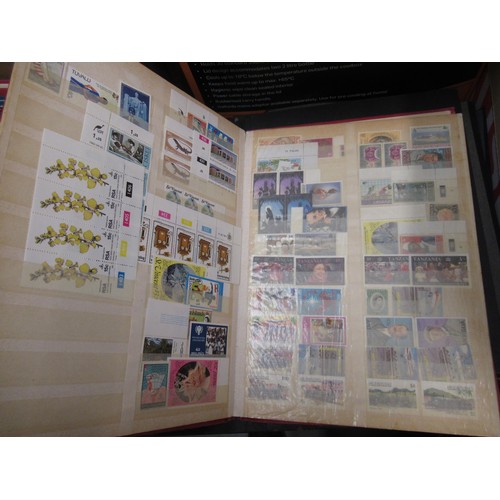 253 - Eleven albums containing a collection of mainly Elizabeth II Great Britain stamps, together with a q... 