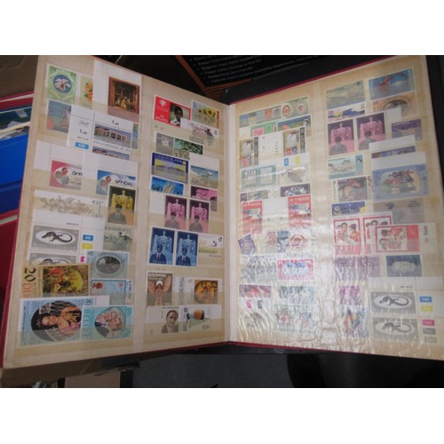 253 - Eleven albums containing a collection of mainly Elizabeth II Great Britain stamps, together with a q... 