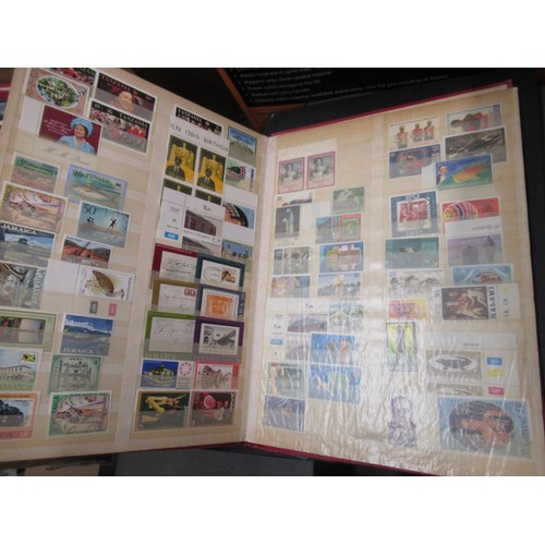 253 - Eleven albums containing a collection of mainly Elizabeth II Great Britain stamps, together with a q... 