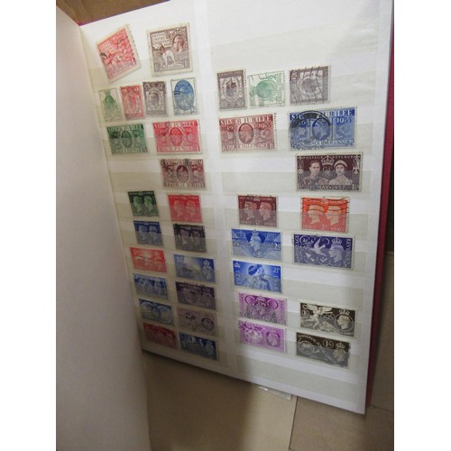 253 - Eleven albums containing a collection of mainly Elizabeth II Great Britain stamps, together with a q... 