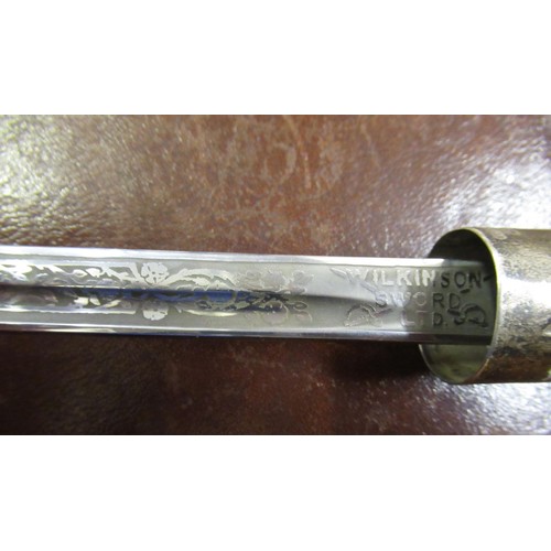 309 - 19th Century silver collared sword stick with etched ' Wilkinson Sword' single fuller blade