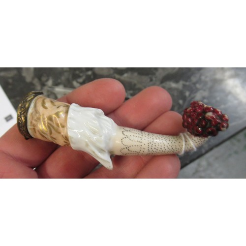 353 - Antique porcelain gilt metal mounted needle case in the form of a lady's arm holding grapes