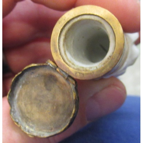 353 - Antique porcelain gilt metal mounted needle case in the form of a lady's arm holding grapes