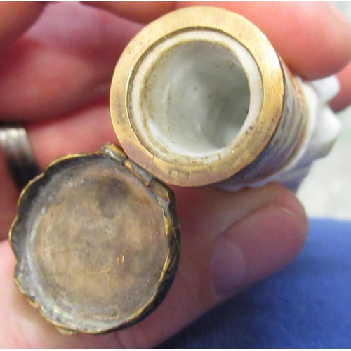 353 - Antique porcelain gilt metal mounted needle case in the form of a lady's arm holding grapes