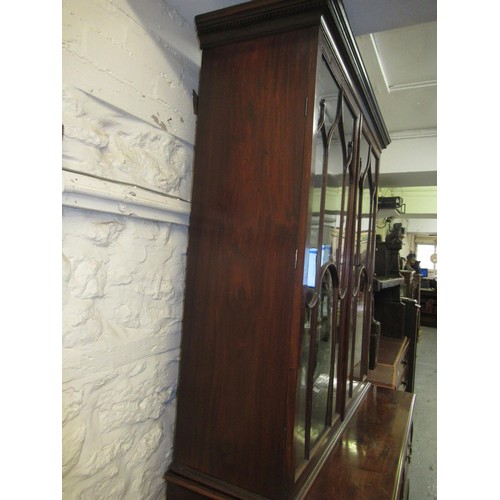 1683 - George III mahogany secretaire bookcase, the moulded cornice above two glazed doors enclosing adjust... 