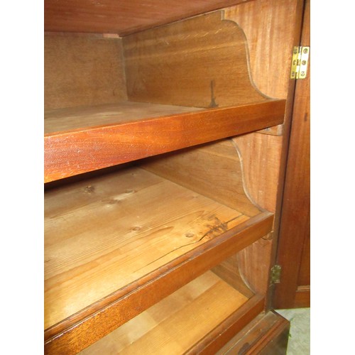 1683 - George III mahogany secretaire bookcase, the moulded cornice above two glazed doors enclosing adjust... 